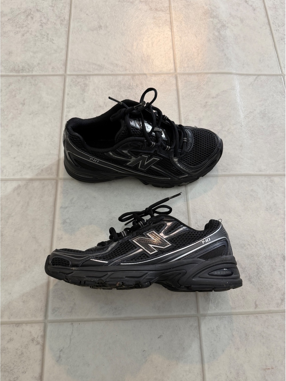 New Balance black running shoes
